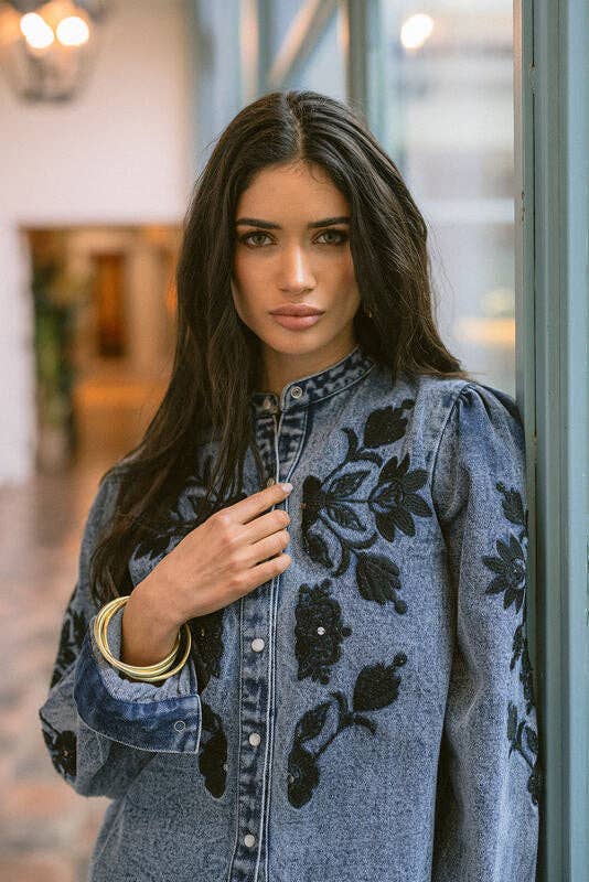 Floral Cosmos Denim Boho Embroidered Overshirt worn by model in natural setting LUXAMORE 