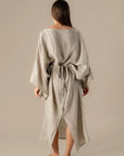 Woman Wearing La Bottega di Brunella Linen Dress VESTITO MOSE' - Battista linen dress LUXAMORE 