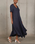 Linen Dress Bias Cut Maxi Made in Italy - Navy worn by model in natural setting LUXAMORE 