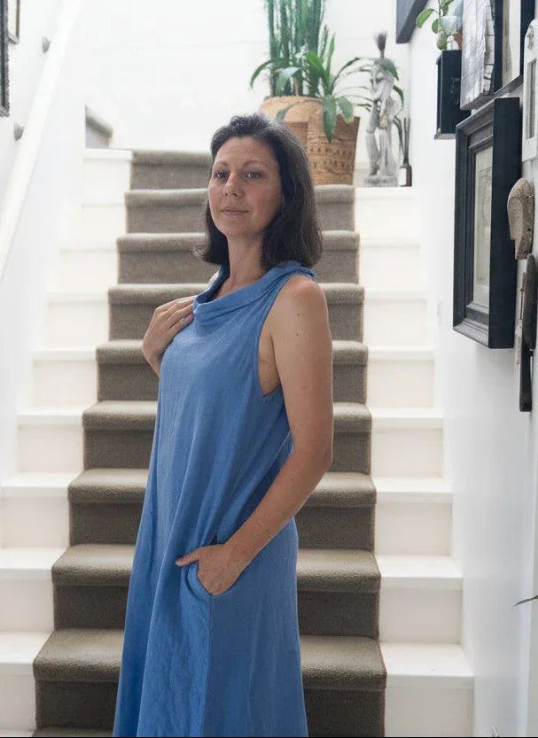 Linen Dress Made in Italy: Sleeveless Boat Neck Maxi Blue worn by model in natural setting LUXAMORE 