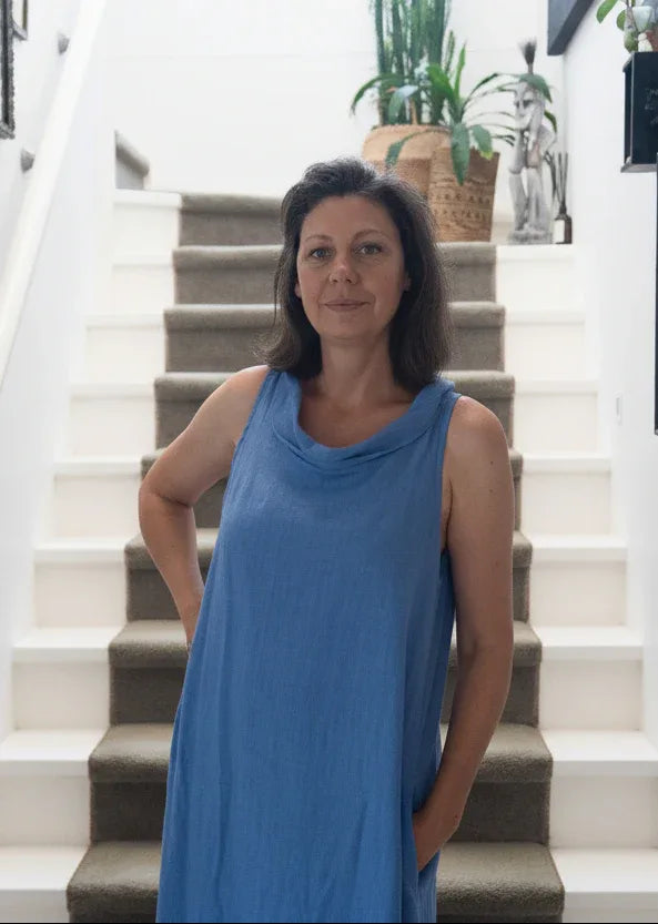 Linen Dress Made in Italy: Sleeveless Boat Neck Maxi Blue worn by model in natural setting LUXAMORE 