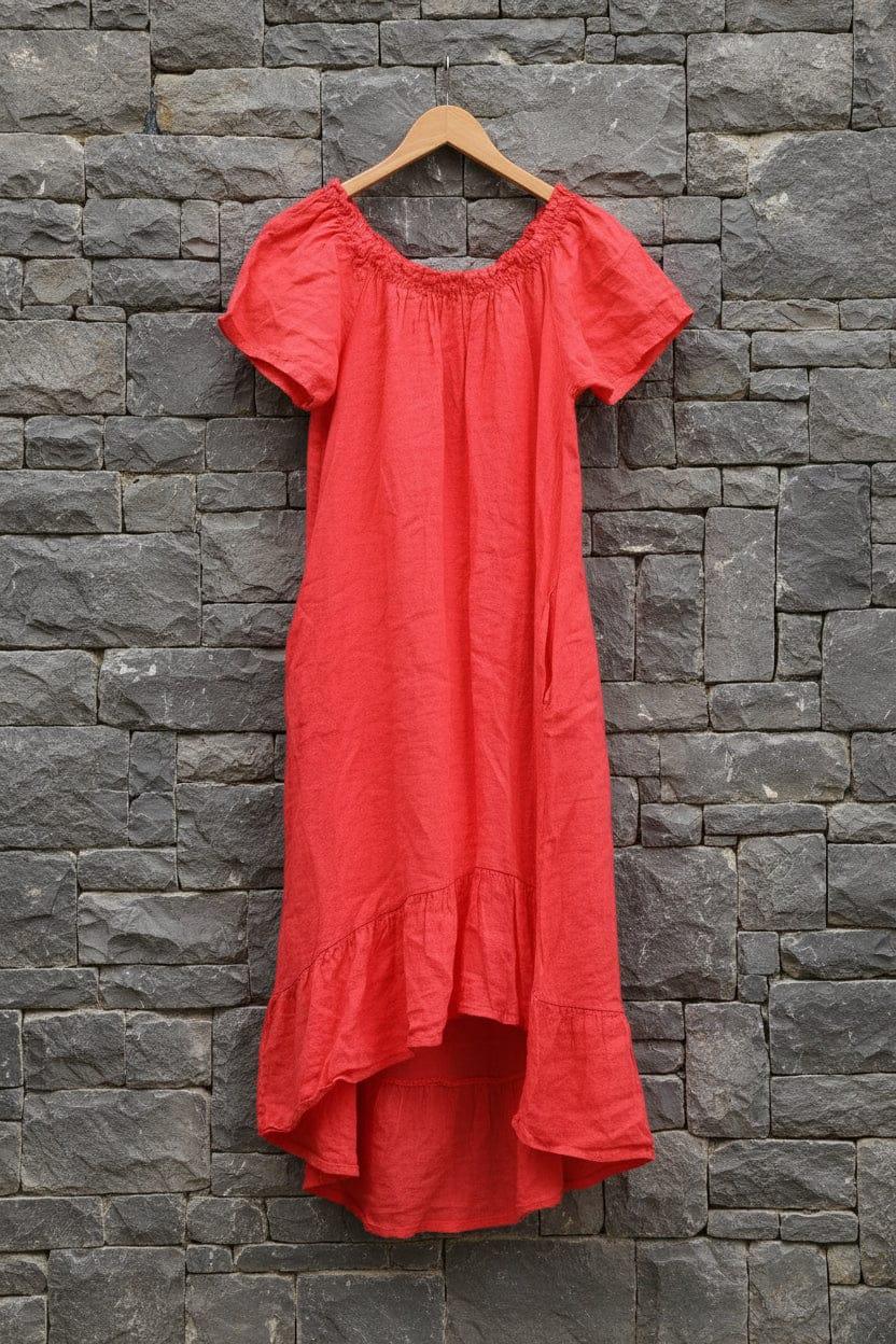 Linen Dress Maxi Off Shoulder Made in Italy Coral worn by model in natural setting LUXAMORE 