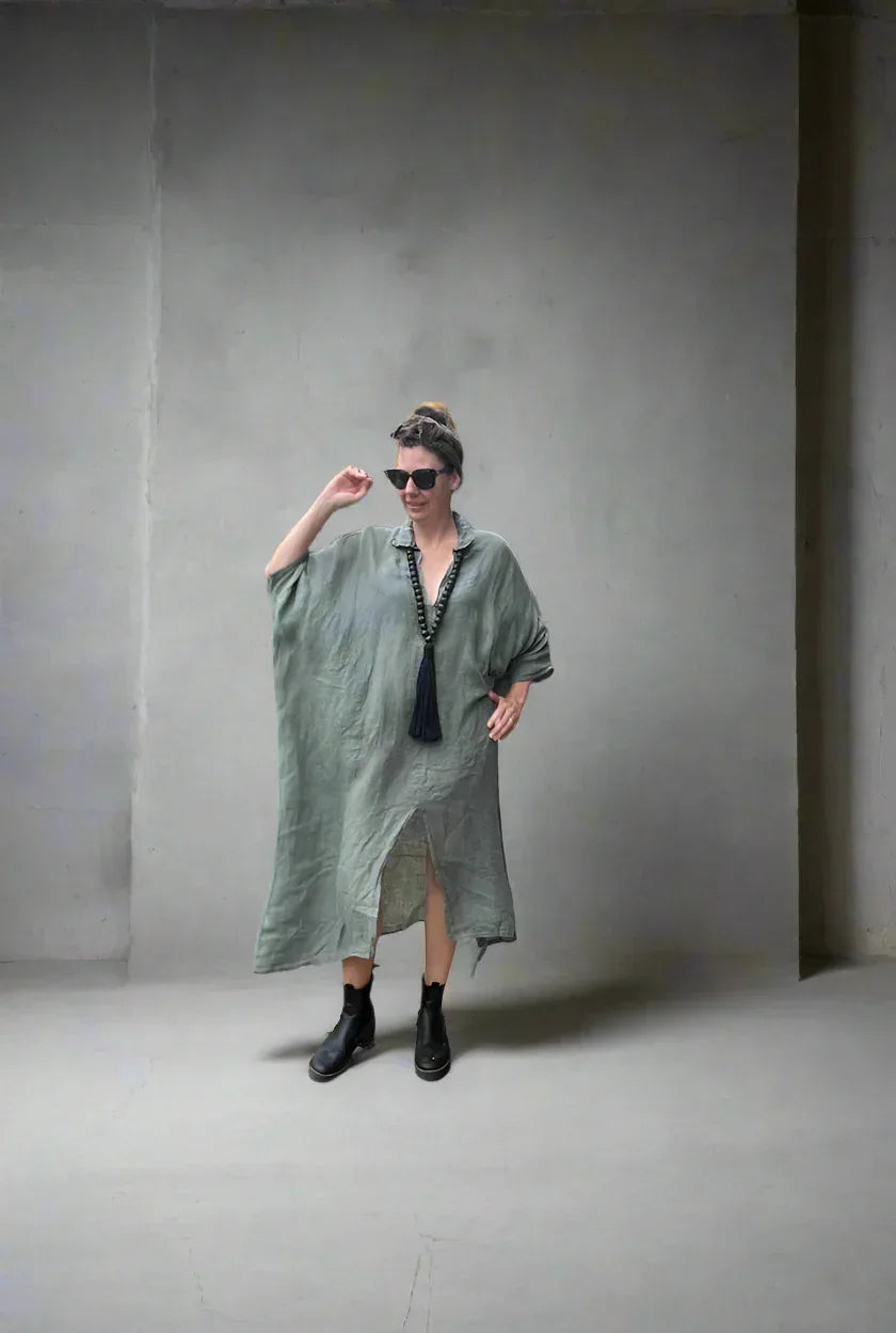 Linen Dress Oversize Maxi Kaftan Made in Italy Olive worn by model in natural setting LUXAMORE 