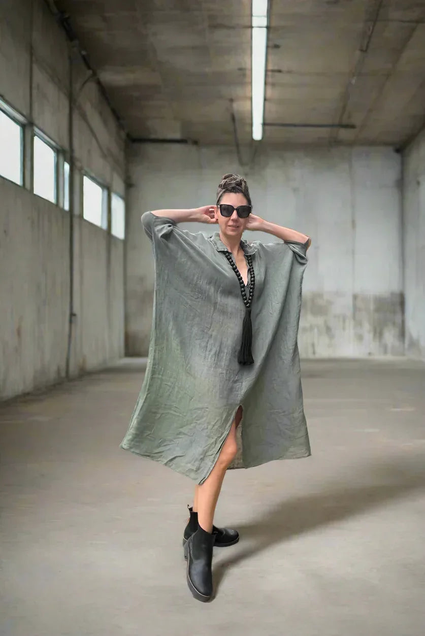 Linen Dress Oversize Maxi Kaftan Made in Italy Olive worn by model in natural setting LUXAMORE 