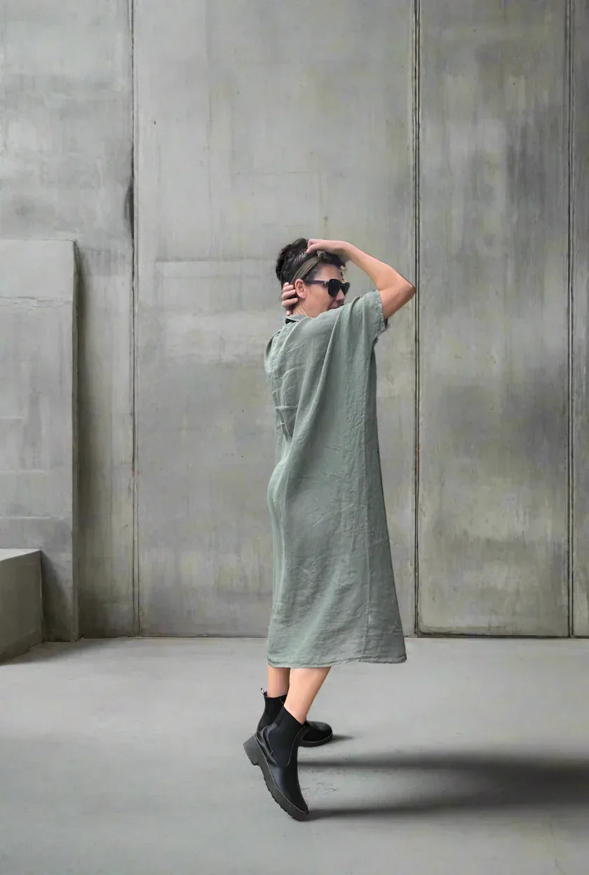 Linen Dress Oversize Maxi Kaftan Made in Italy Olive worn by model in natural setting LUXAMORE 