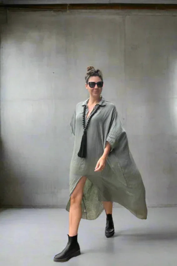 Linen Dress Oversize Maxi Kaftan Made in Italy Olive worn by model in natural setting LUXAMORE 