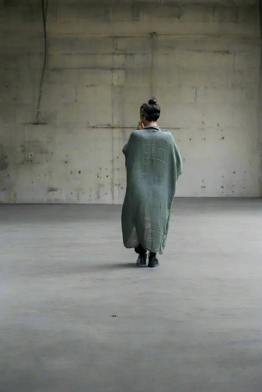 Linen Dress Oversize Maxi Kaftan Made in Italy Olive worn by model in natural setting LUXAMORE 
