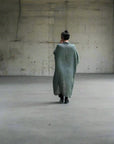 Linen Dress Oversize Maxi Kaftan Made in Italy Olive worn by model in natural setting LUXAMORE 
