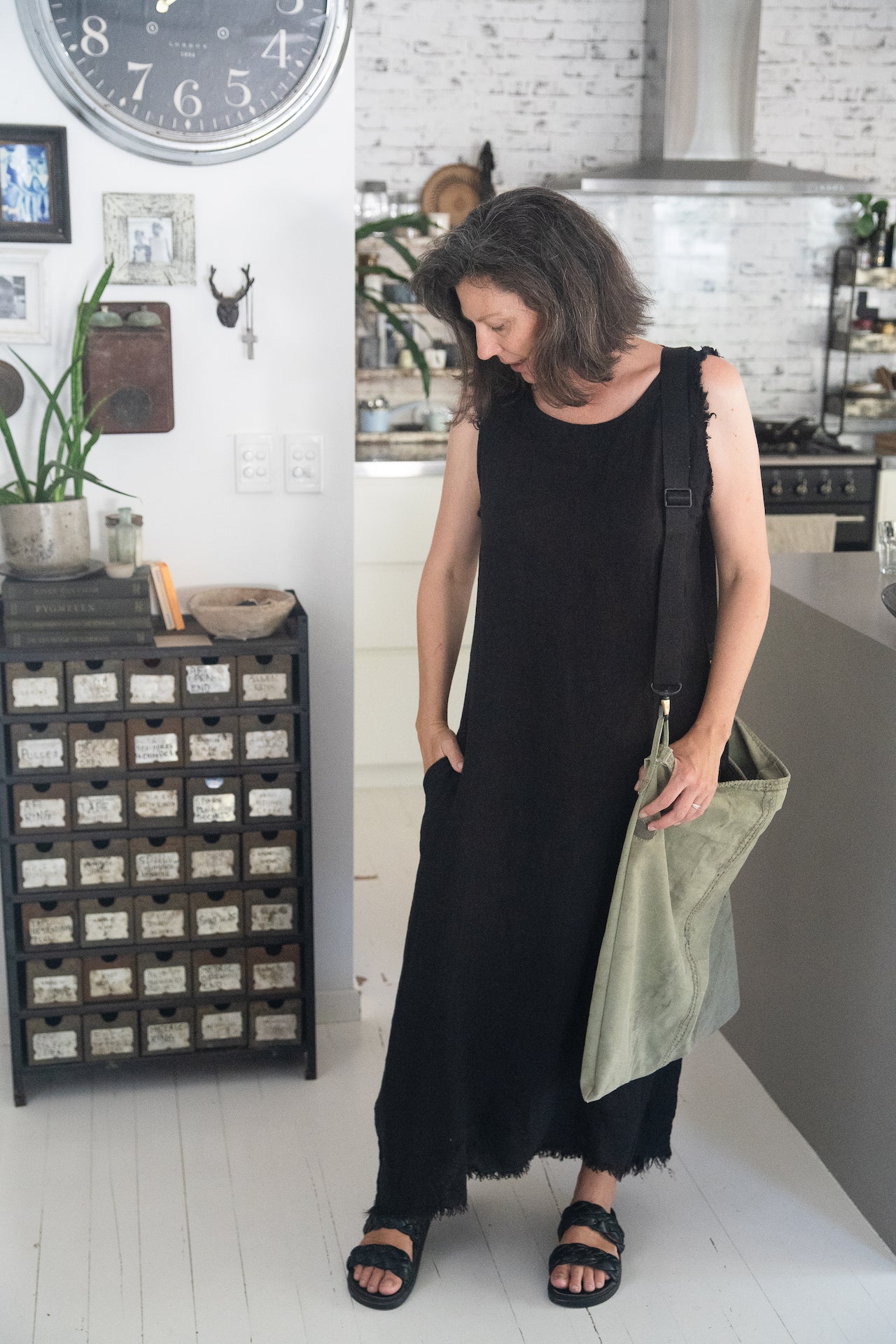 Linen Dress Sleeveless Raw Edge, Maxi Made in Italy Black worn by model in natural setting LUXAMORE 