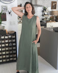 Linen Dress Sleeveless Raw Edge, Maxi Made in Italy Khaki worn by model in natural setting LUXAMORE 