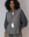 Linen Shirt Grandpa Collar Button up - Made In Italy - Charcoal Grey worn by model in natural setting LUXAMORE 