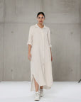 Linen Shirtdress, Button-Up, Maxi Made in Italy Beige worn by model in natural setting LUXAMORE 