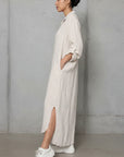 Linen Shirtdress, Button-Up, Maxi Made in Italy Beige worn by model in natural setting LUXAMORE 