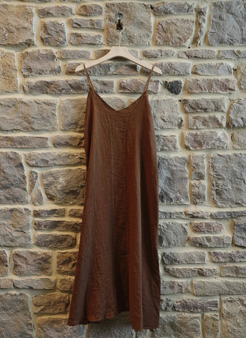 Linen Slip Dress Midi Made in Italy Brown worn by model in natural setting LUXAMORE 