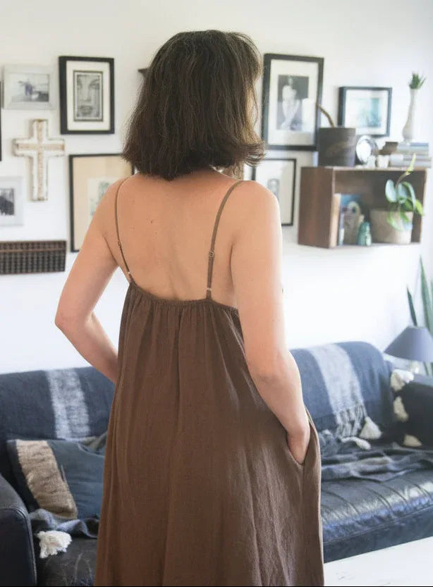Linen Slip Dress Midi Made in Italy Brown worn by model in natural setting LUXAMORE 