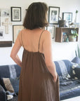 Linen Slip Dress Midi Made in Italy Brown worn by model in natural setting LUXAMORE 