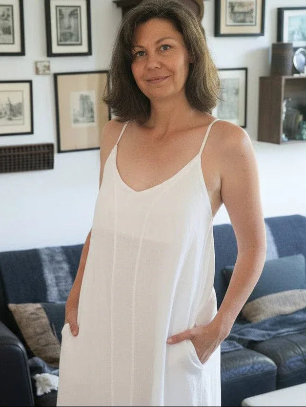 Linen Slip Dress Midi Made in Italy White worn by model in natural setting LUXAMORE 