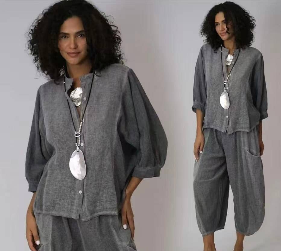 Linen Trousers made in Italy Charcoal Grey worn by model in natural setting LUXAMORE 