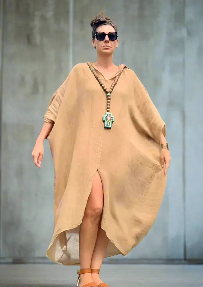 Linen Dress Oversize Maxi Kaftan Made in Italy Caramel worn by model in natural setting LUXAMORE 