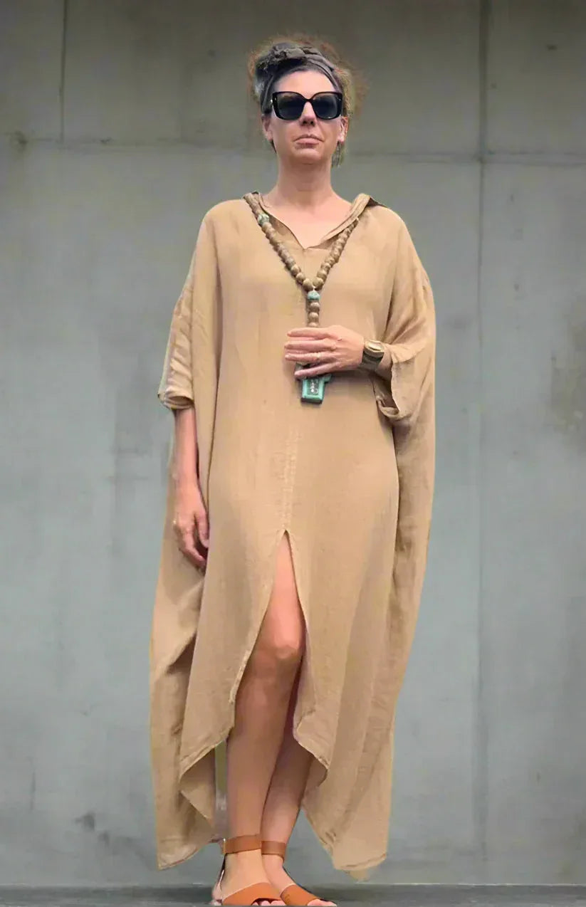 Linen Dress Oversize Maxi Kaftan Made in Italy Caramel worn by model in natural setting LUXAMORE 