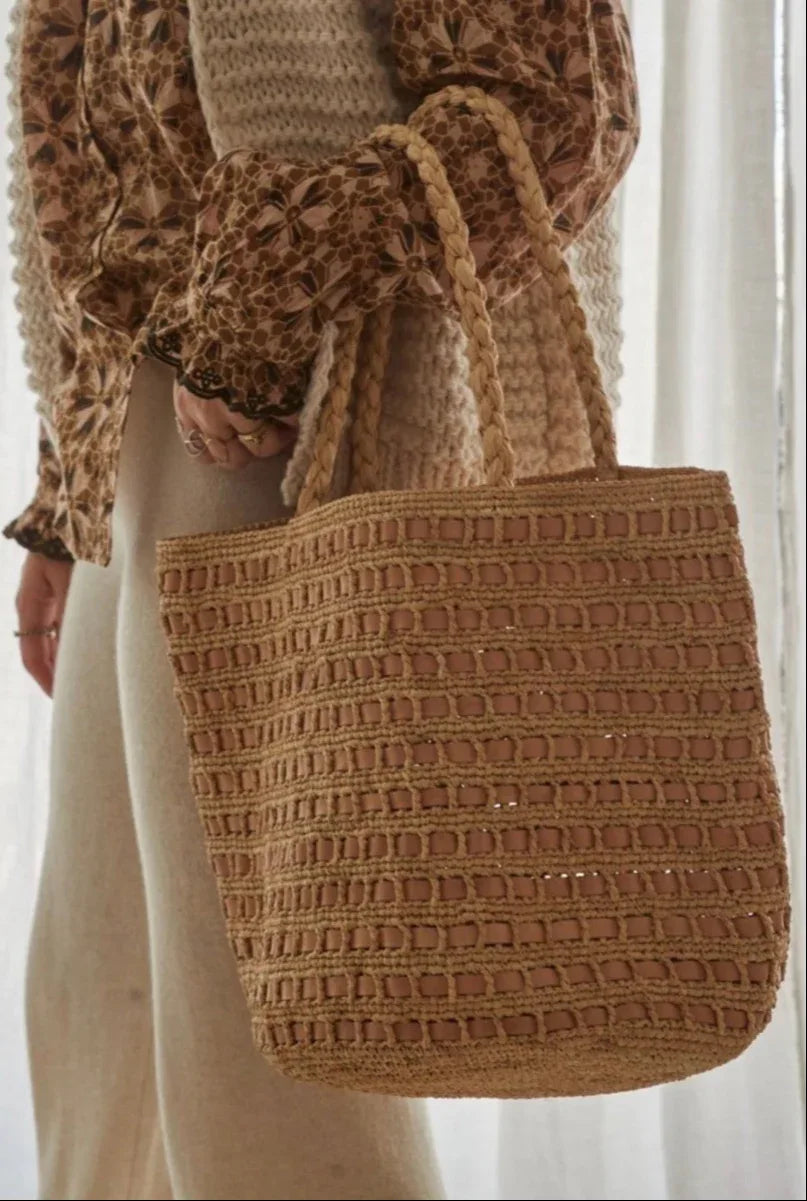 Made in Mada Bag Vony worn by model in natural setting LUXAMORE 