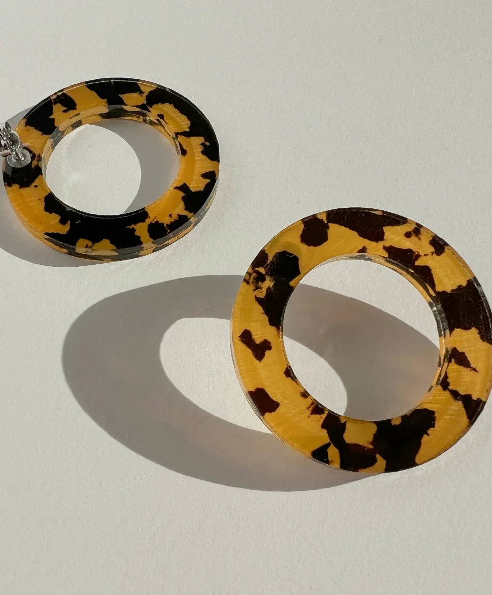 Mingled Hoop Stud Earrings - Honey Tortoise Shell worn by model in natural setting LUXAMORE 