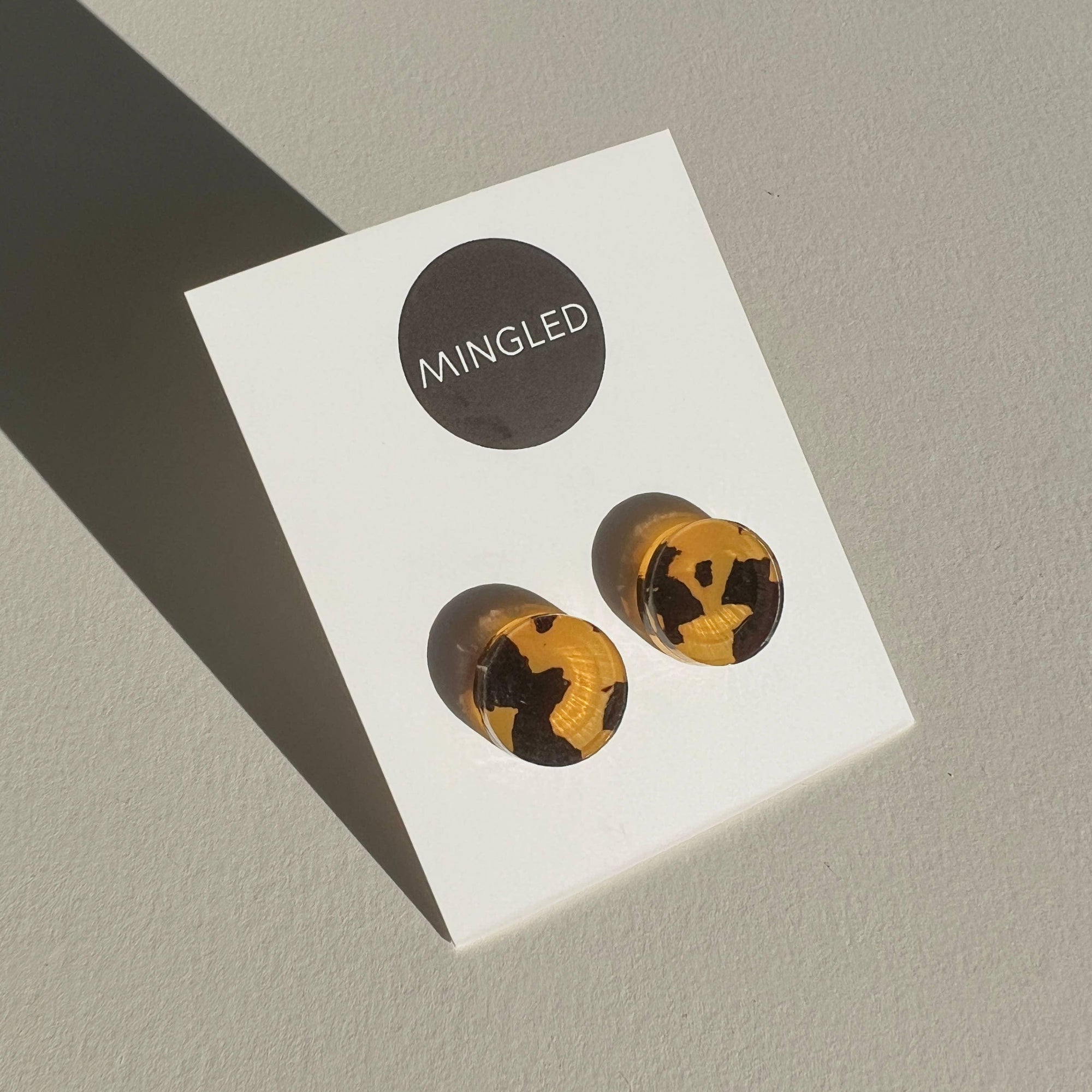 Mingled Tortoise Shell Round Stud Earrings - 15mm worn by model in natural setting LUXAMORE 