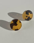 Mingled Tortoise Shell Round Stud Earrings - 15mm worn by model in natural setting LUXAMORE 