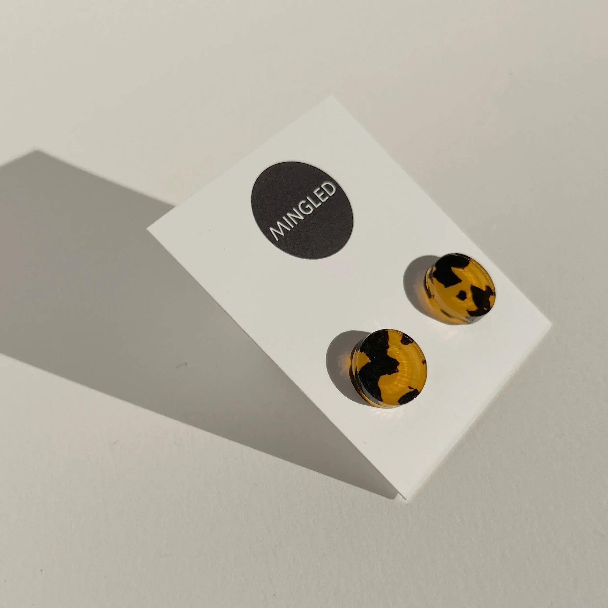 Mingled Tortoise Shell Round Stud Earrings - 15mm worn by model in natural setting LUXAMORE 