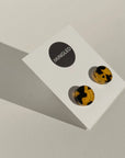 Mingled Tortoise Shell Round Stud Earrings - 15mm worn by model in natural setting LUXAMORE 
