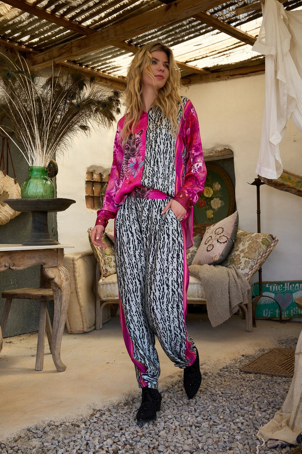Miss Goodlife Pink Animal Love Pants worn by model in natural setting LUXAMORE 