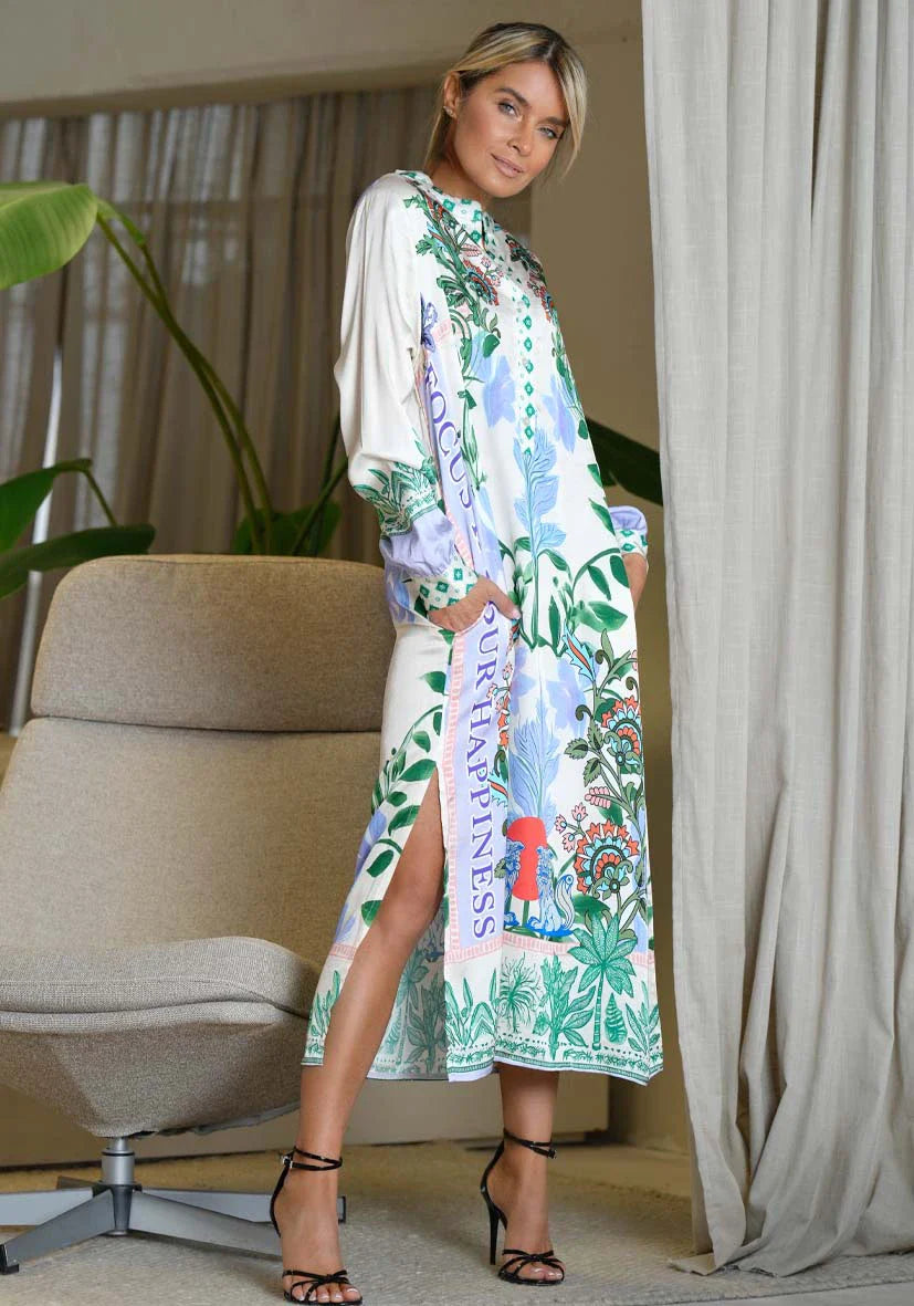 Pre Order Miss Goodlife Midi Dress Green Garden worn by model in natural setting LUXAMORE 