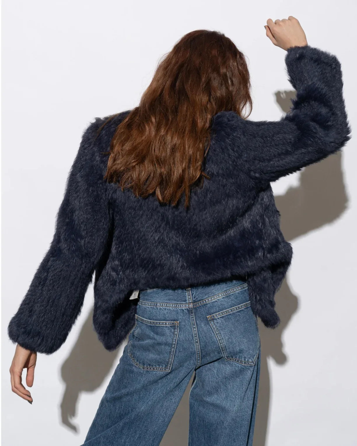 Mode & Affaire Cascade Fur Coat In Ink worn by model in natural setting LUXAMORE 