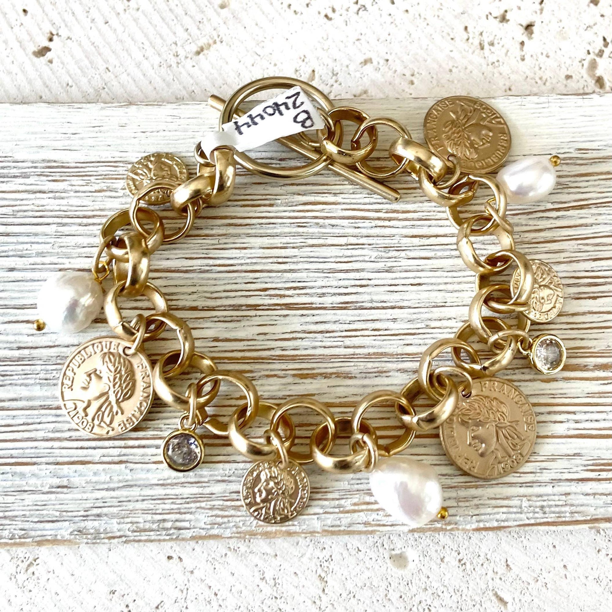 Pre Order Charm coin bracelet French coin jewelry pearl fall jewelry: Silver worn by model in natural setting LUXAMORE 