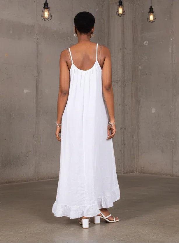 White Linen Dress Maxi Ruffled Made in Italy - One size worn by model in natural setting LUXAMORE 