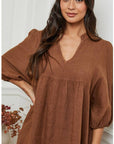 Linen Dress Balloon Sleeve - Made in Italy - Tobacco worn by model in natural setting LUXAMORE 