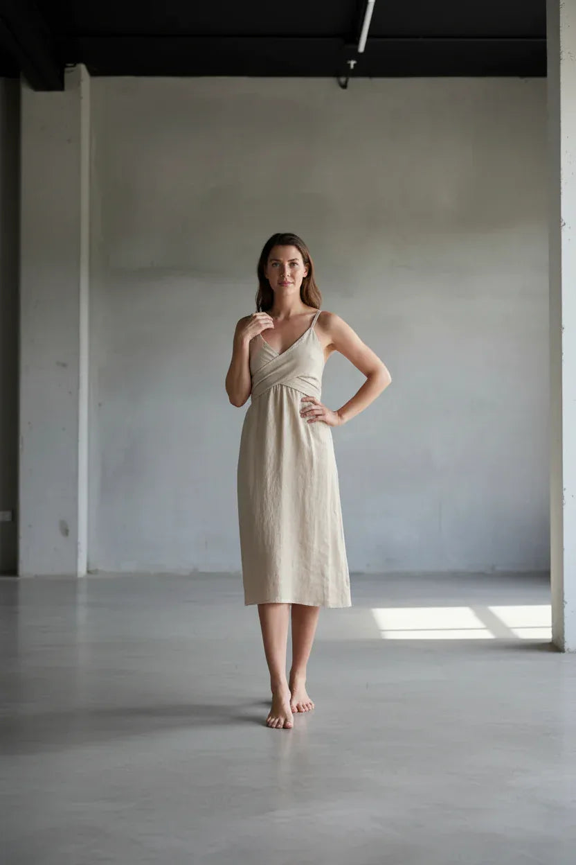 Linen Dress Cross Tie Made in Italy beige worn by model in natural setting LUXAMORE 