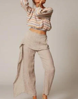 Estilo Emporio Linen Pant Coco worn by model in natural setting LUXAMORE 