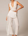 Estilo Emporio Linen Pant Coco worn by model in natural setting LUXAMORE 