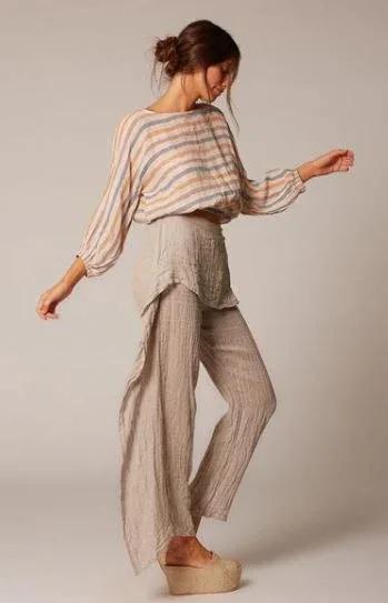 Estilo Emporio Poppy Top worn by model in natural setting LUXAMORE 