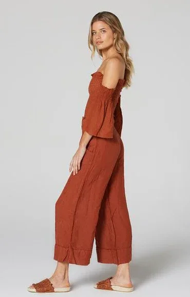 Estilo Emporio Linen Pant Tropez - Rust worn by model in natural setting LUXAMORE 